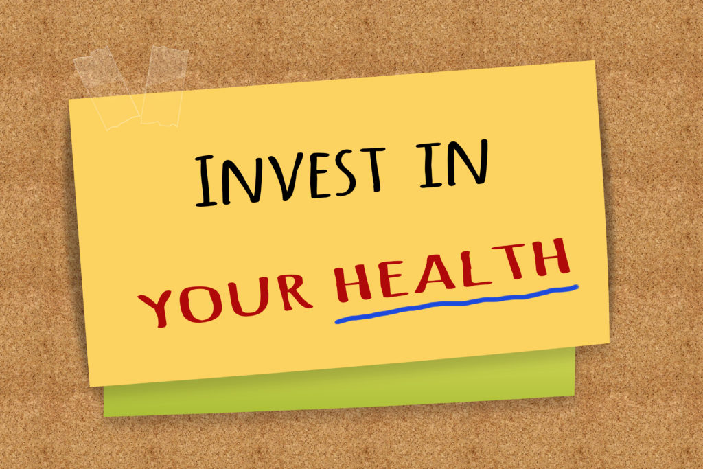 Invest in your health on sticky note